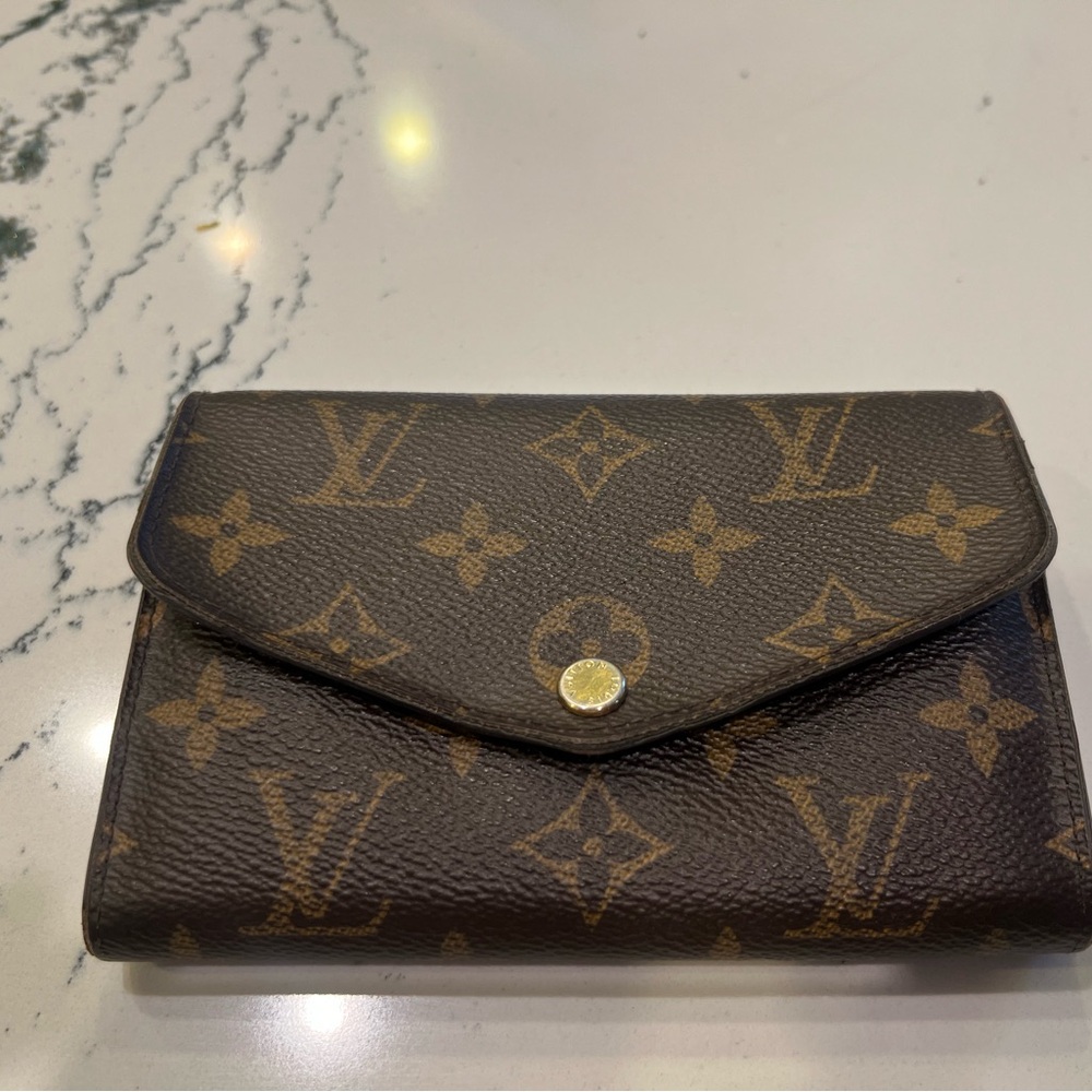 Louis Vuitton 6” wide x 4” high new snap front wallet
